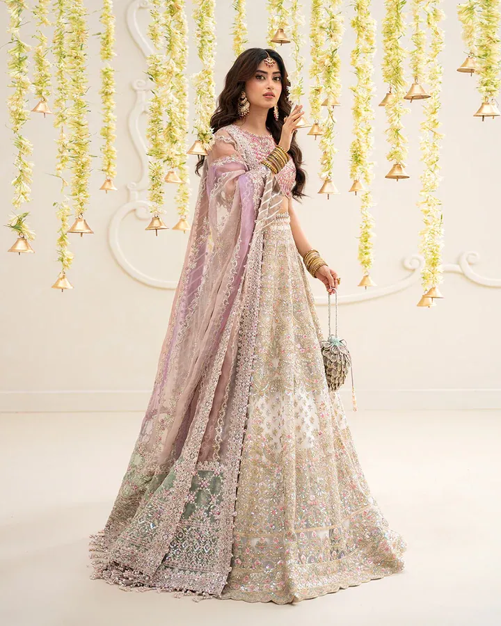 Suzan fuses sensual fabrics with artistic embroideries to create a look of effortless sophistication.